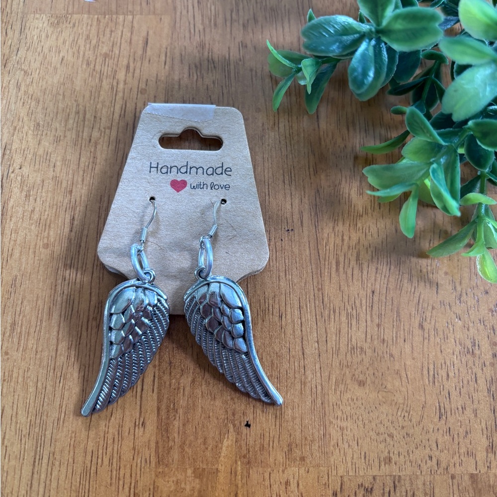 Handmade large feather earrings